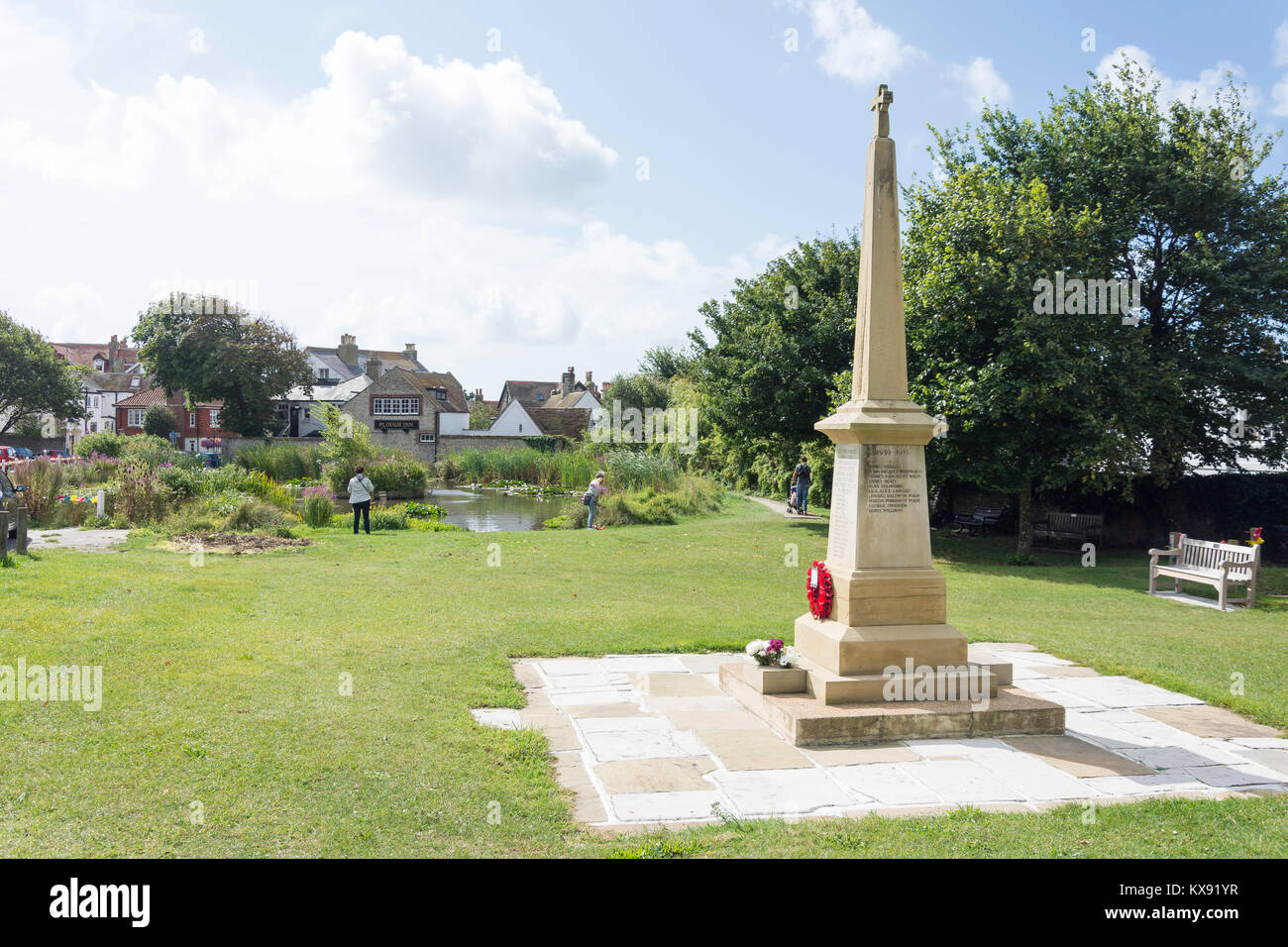 The pond and war memorial on The Green, Rottingdean, East Sussex, England, United Kingdom Stock Photo
