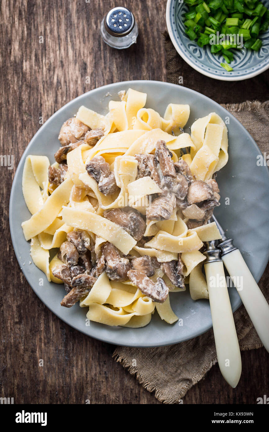 Pasta tagliatelle with mushrooms Stock Photo Alamy