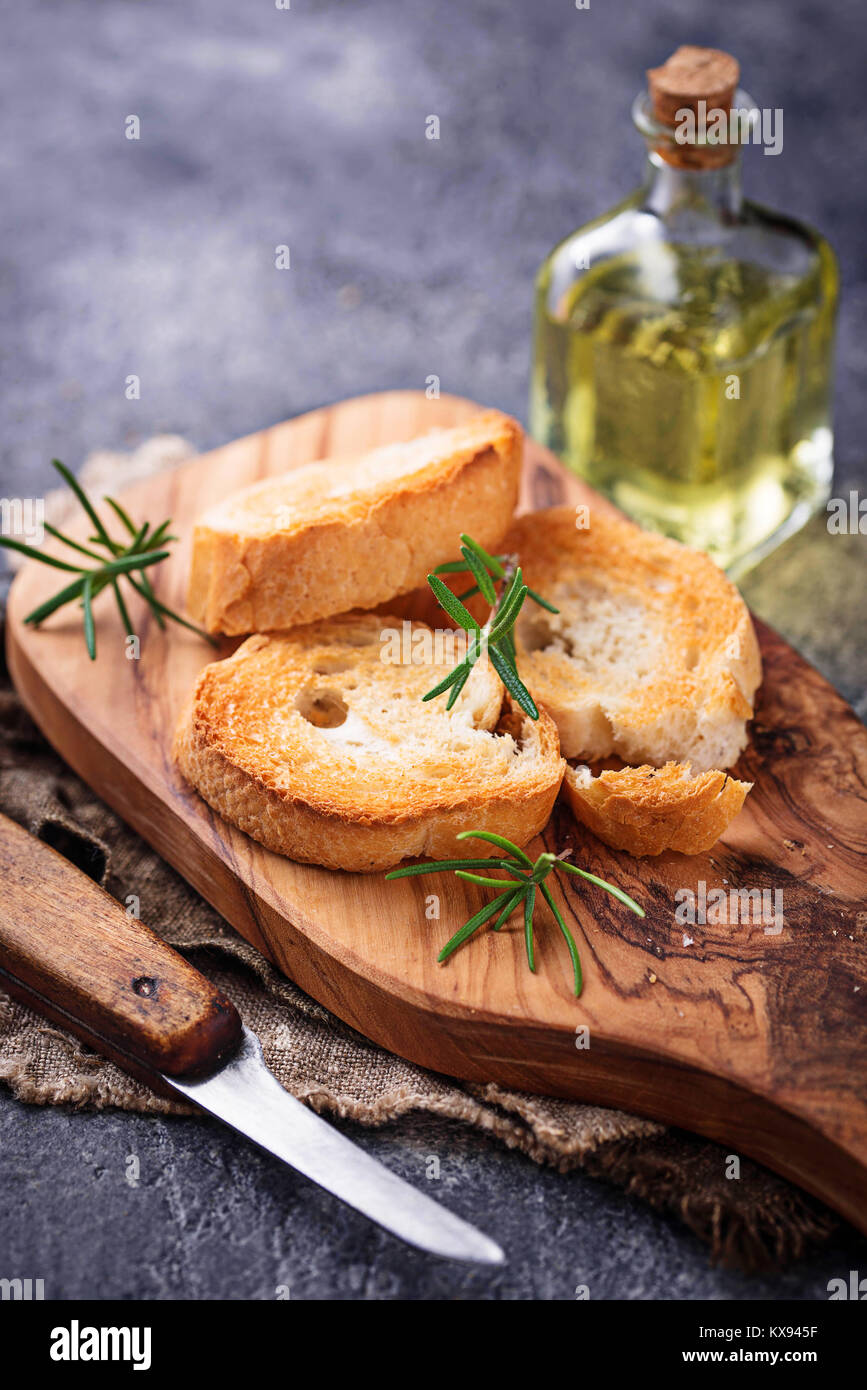 Toasted bread with olive oil and rosemary Stock Photo Alamy