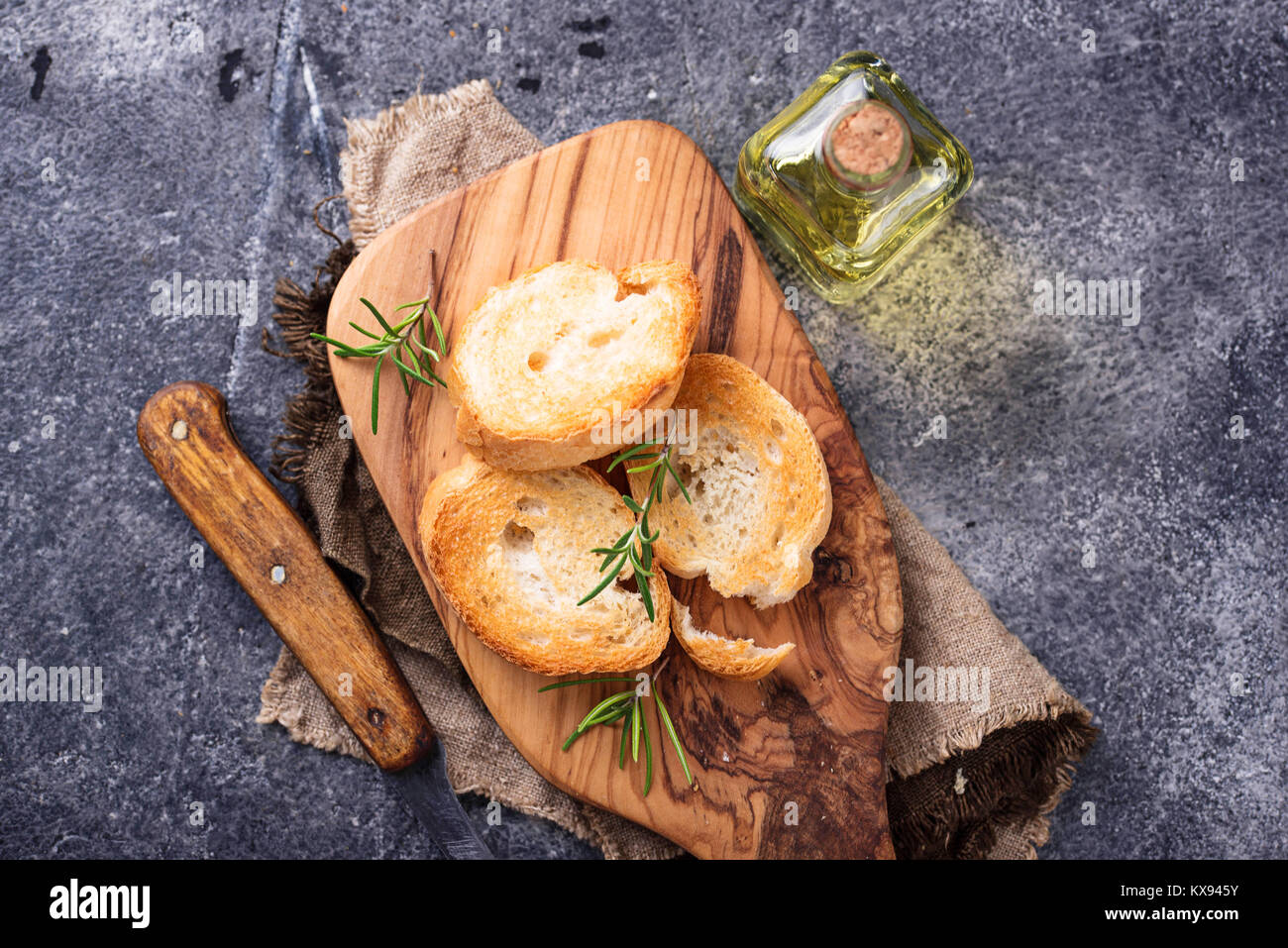 Toasted bread with olive oil and rosemary Stock Photo Alamy