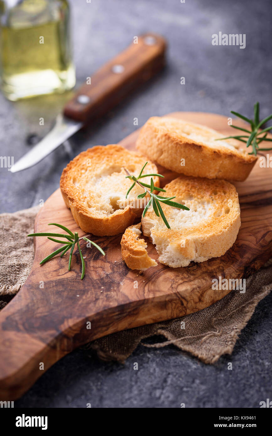 Toasted bread with olive oil and rosemary Stock Photo Alamy