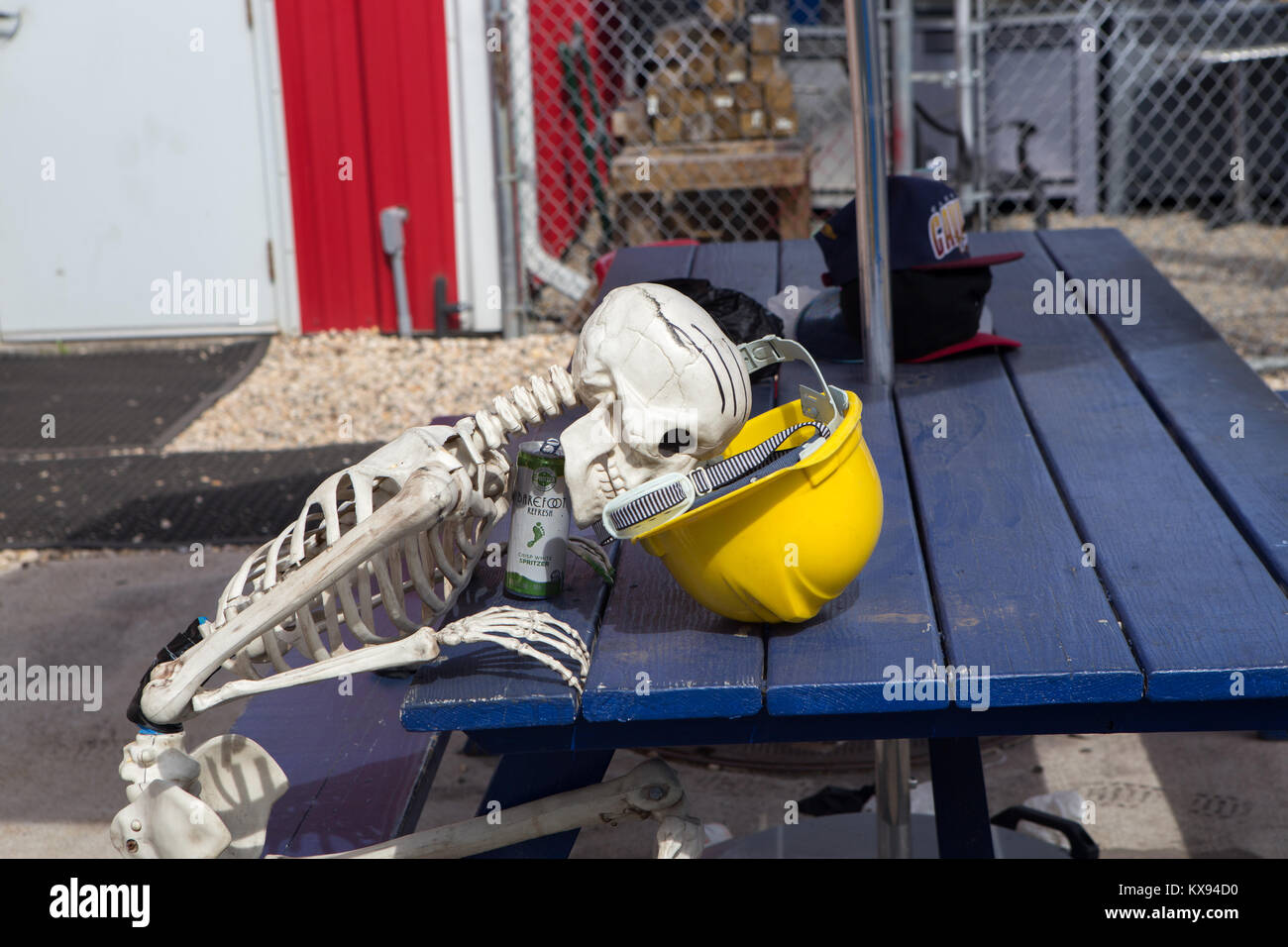 A funny skeleton with a working helmet Stock Photo