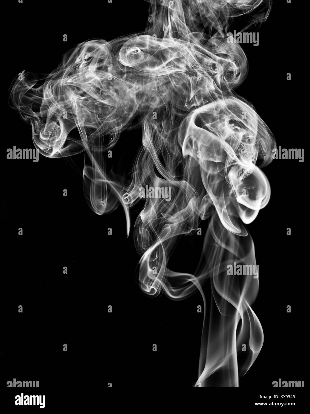 A Whisp Of White Smoke Against The Black Background Stock Photo Alamy