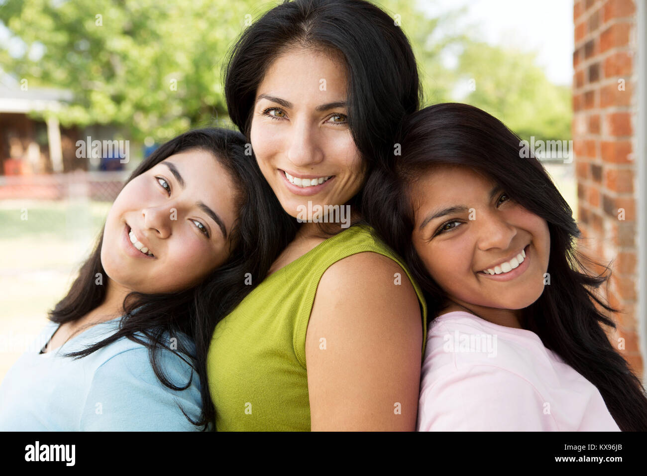Hispanic mother and daughters. Stock Photo
