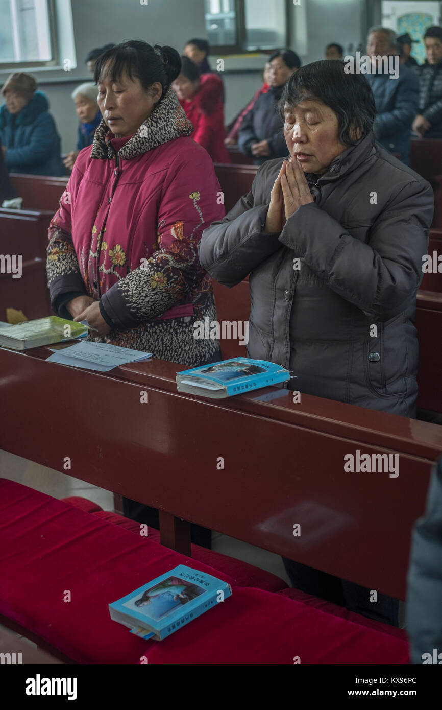 Christmas Mass at Sacred Heart of Jesus Church in Housangyu village, 70 kilometers west of Beijing center, one of the earliest churches in China. 25-Dec-2017 Stock Photo