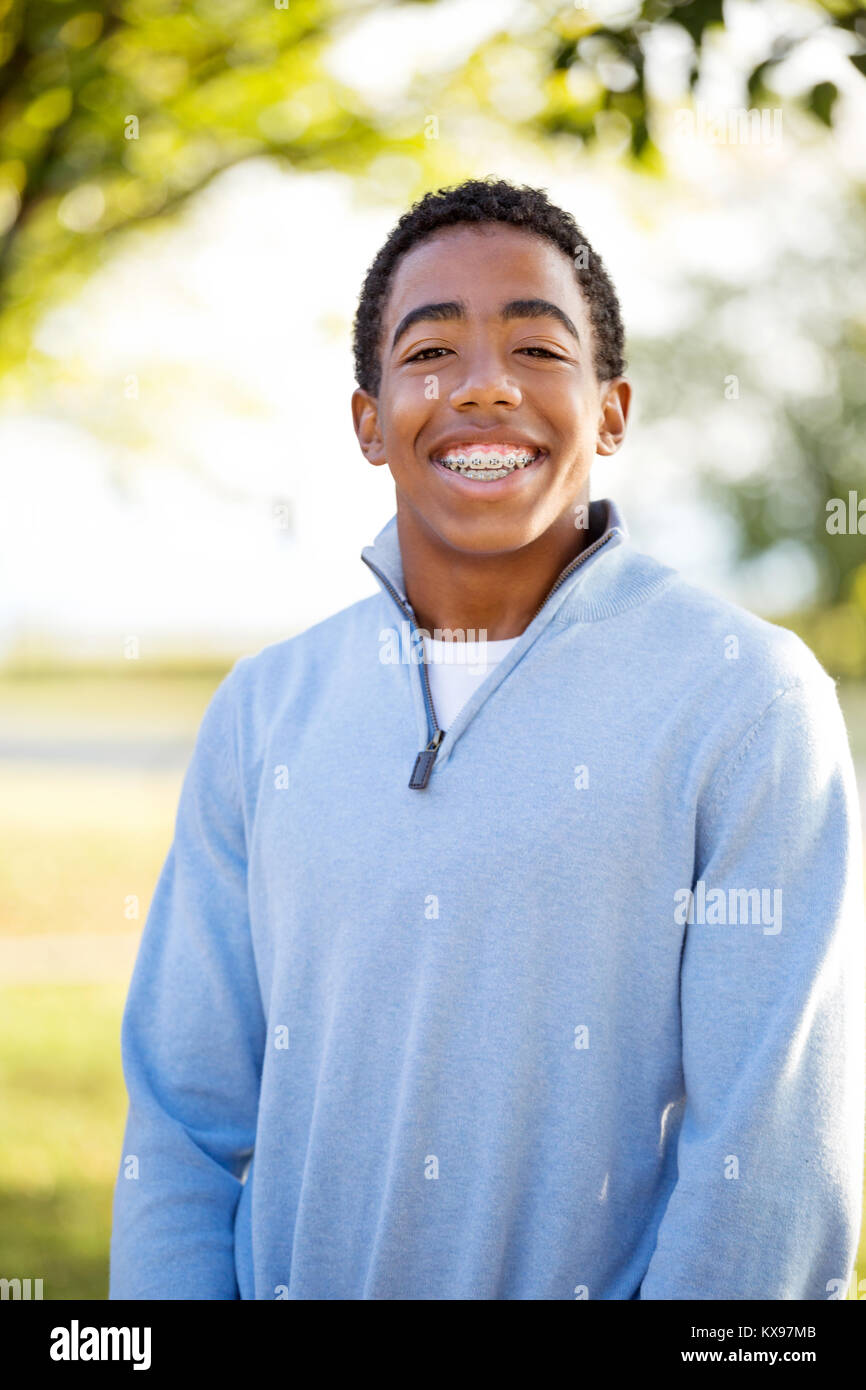 Teenage boy smiling. Stock Photo