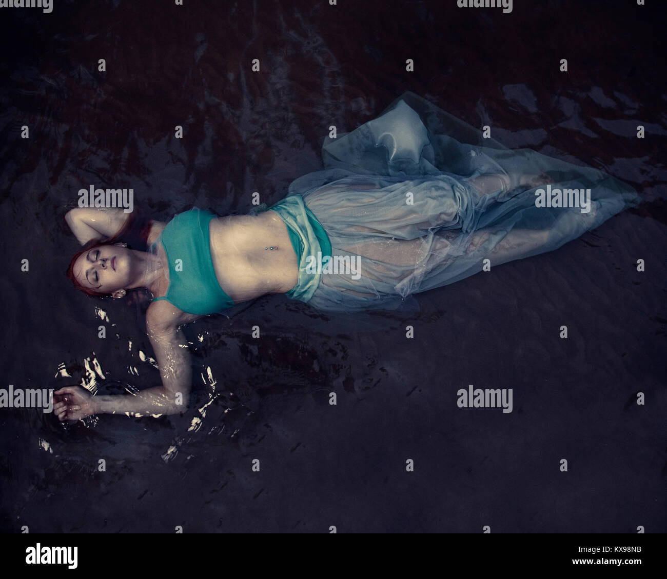 Girl Floating in Water Stock Photo Alamy
