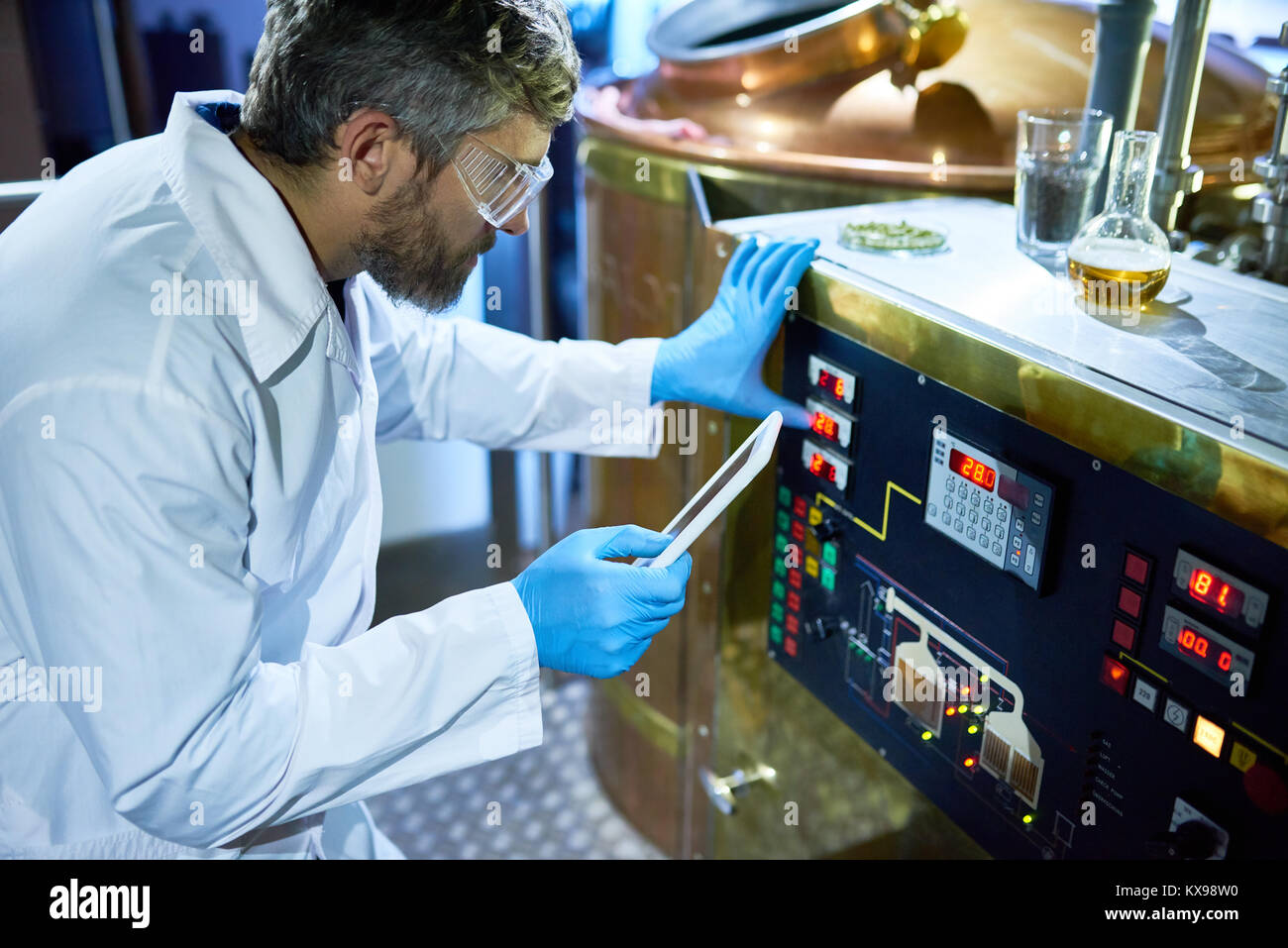 Adjusting machine hi-res stock photography and images - Alamy