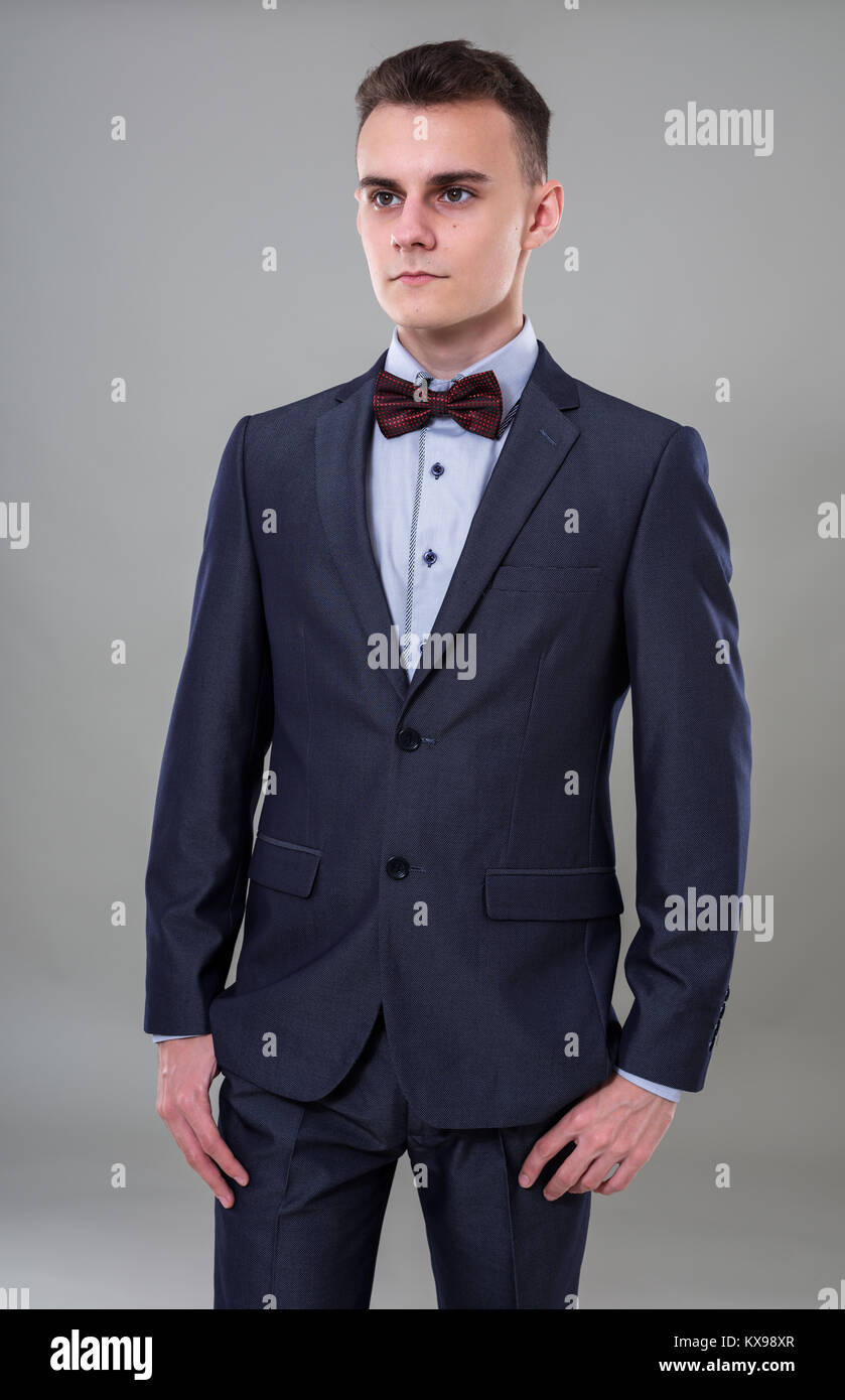 Closeup of a young man in classic business suit Stock Photo - Alamy