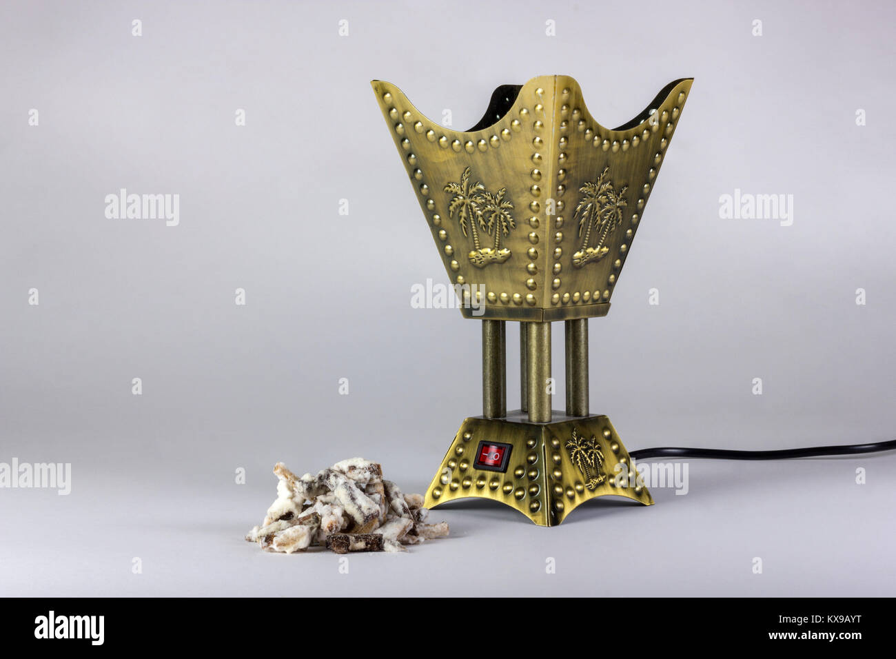 Golden censer incense burner isolated on white background Stock Photo