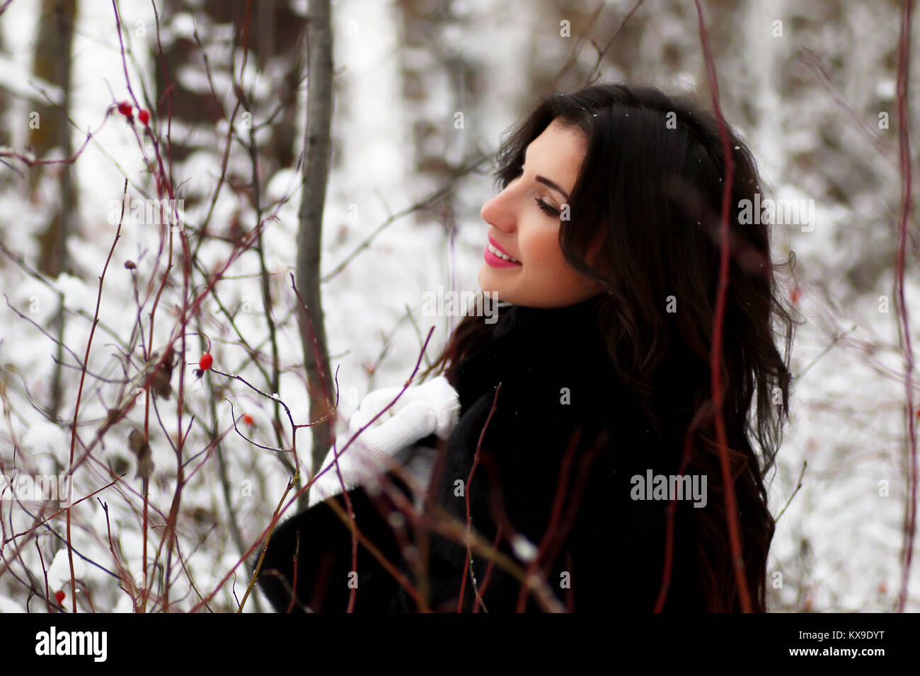 A young woman walk in a winter park Stock Photo - Alamy