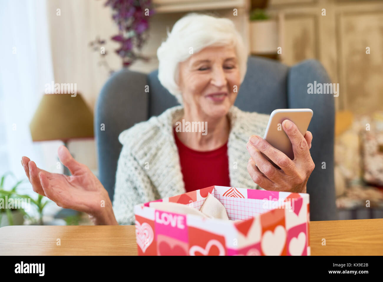 Christmas Present for Tech-Savvy Woman Stock Photo