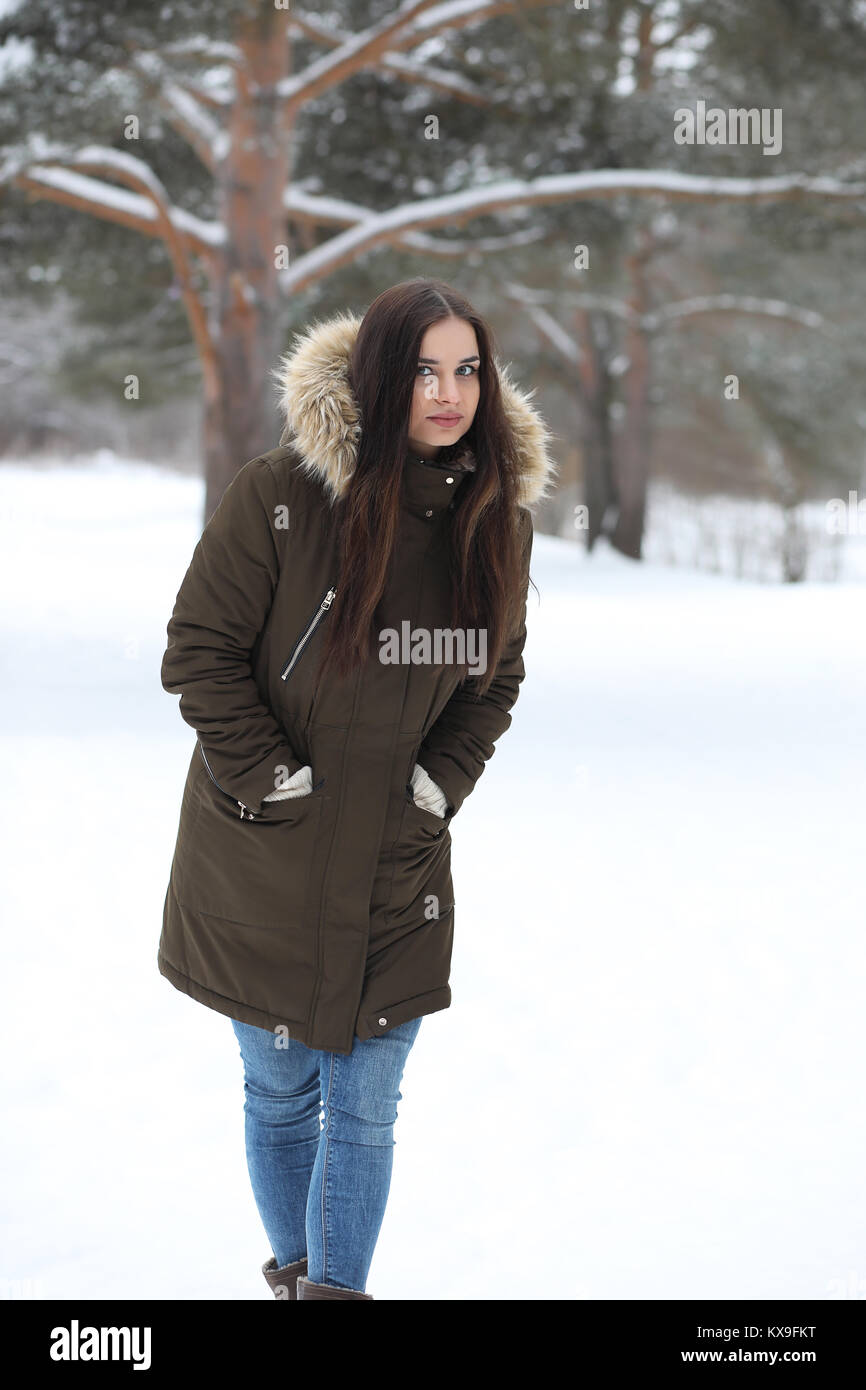 Beautiful girl in a beautiful winter park Stock Photo - Alamy