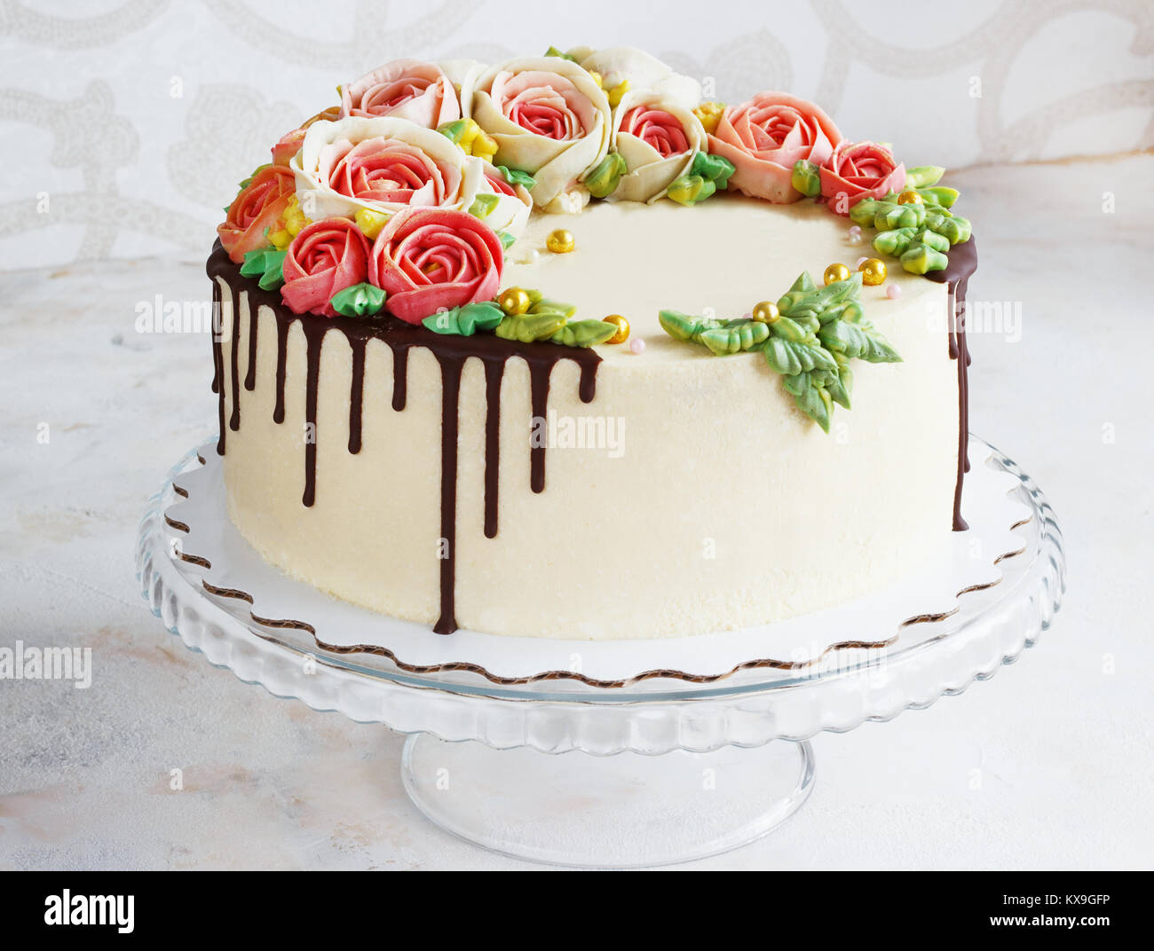 Birthday cake with flowers rose on white background Stock Photo - Alamy