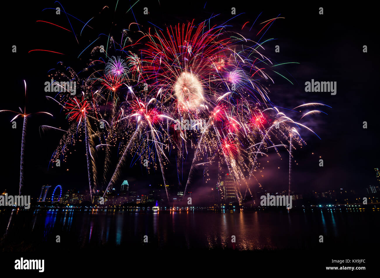 Firework display for Singapore National day which celebrated every year on August 9, in commemoration of the Singapore's independence in 1965. Stock Photo