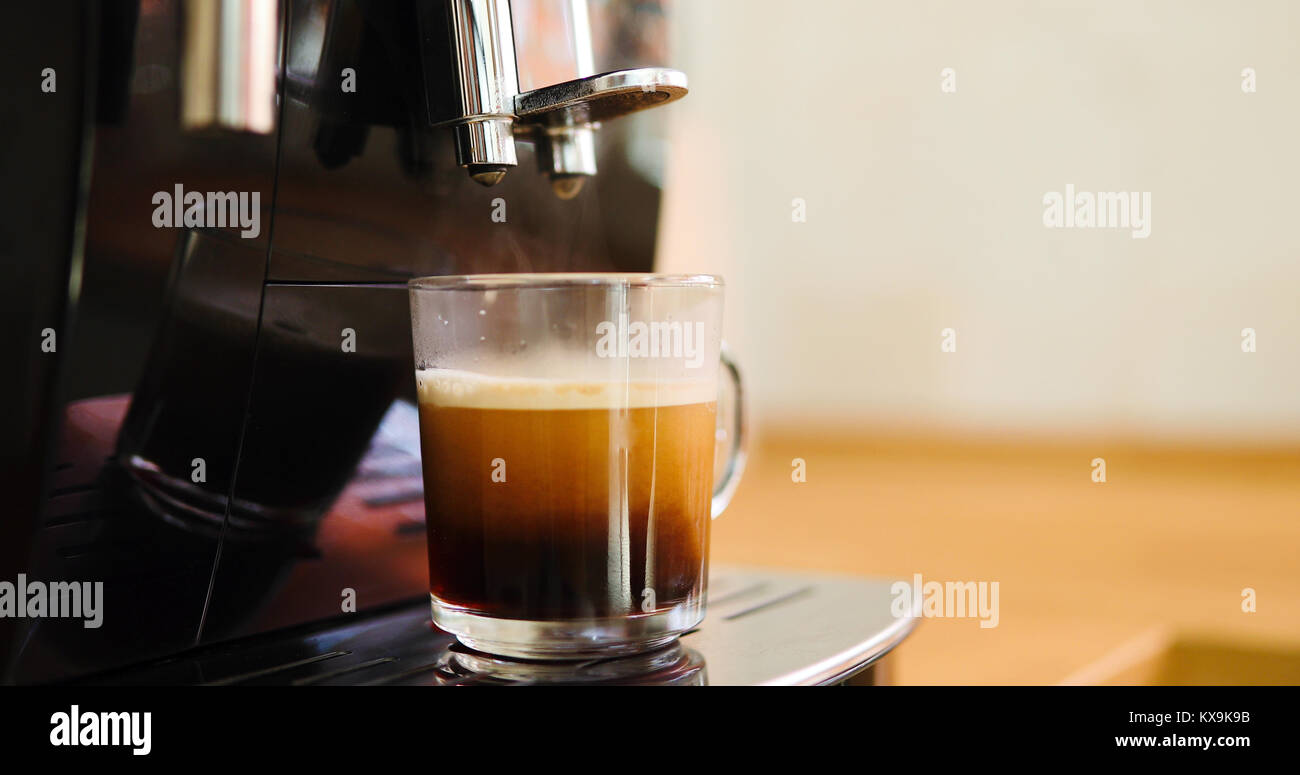 Coffee machine making coffee in morning with crema Stock Photo Alamy