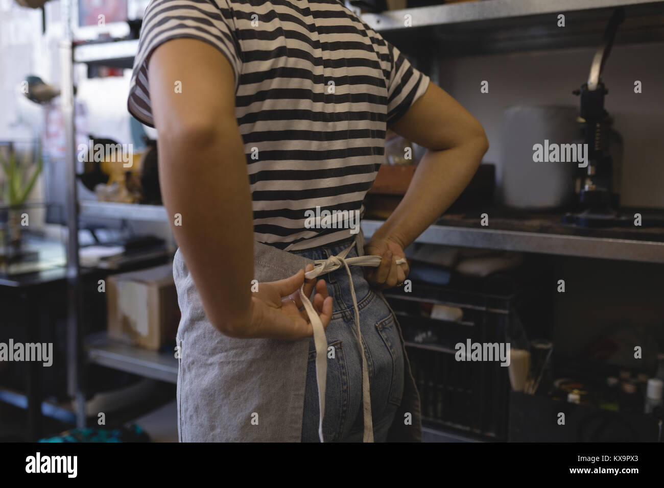Female apron hi-res stock photography and images - Alamy