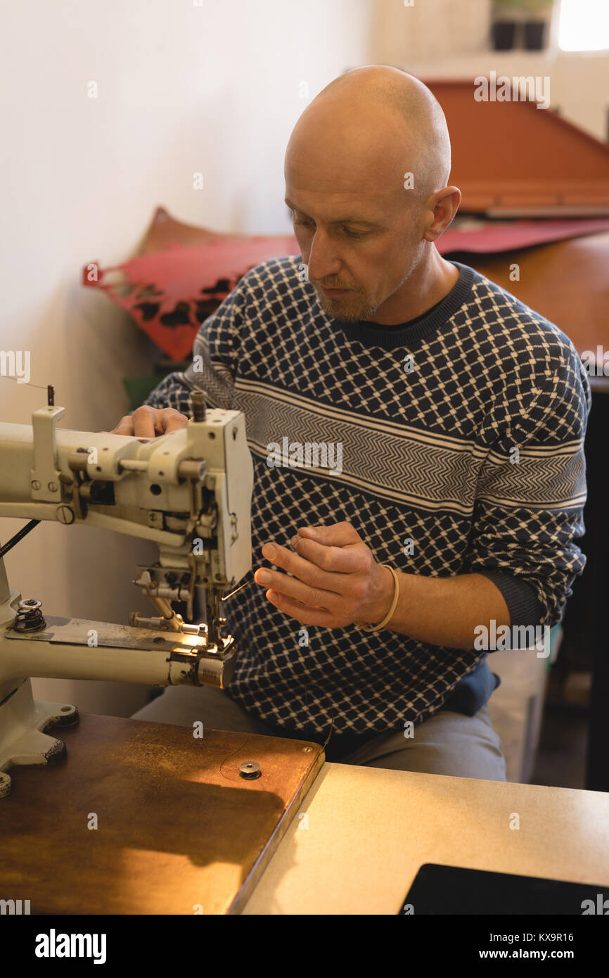 Worker using sewing machine Stock Photo Alamy