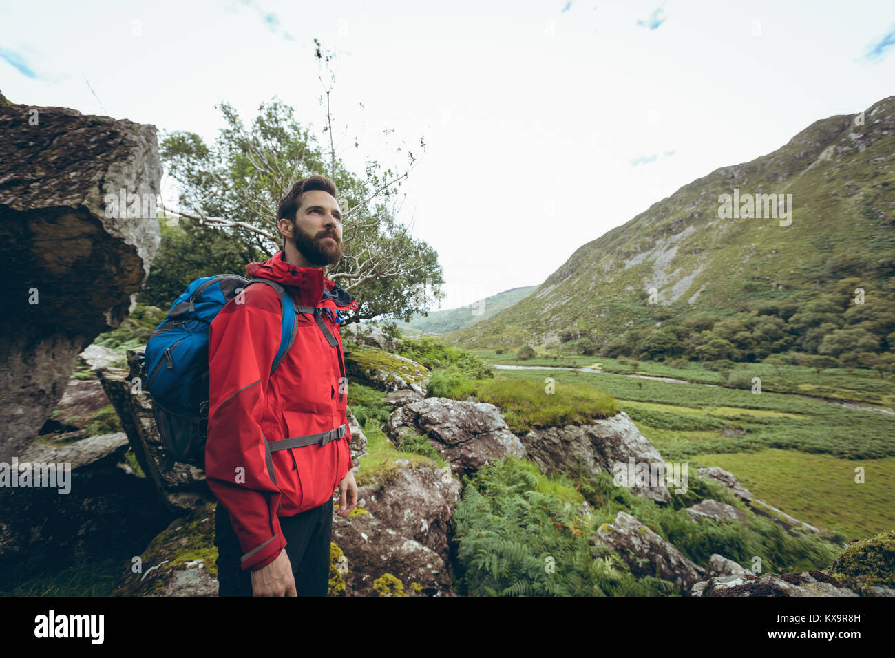 Hiker looking up hill hi-res stock photography and images - Alamy