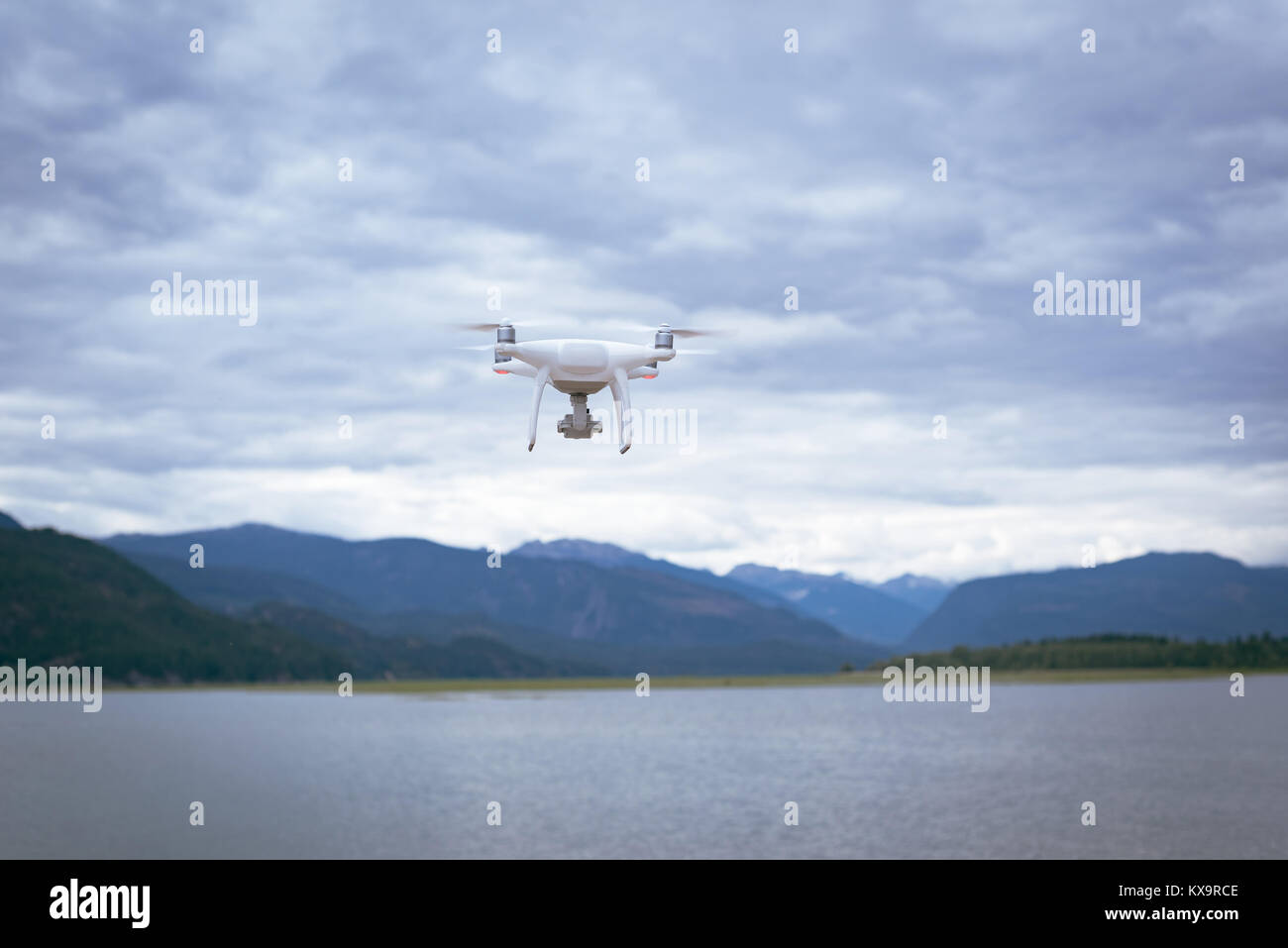 Drone flying over a river Stock Photo