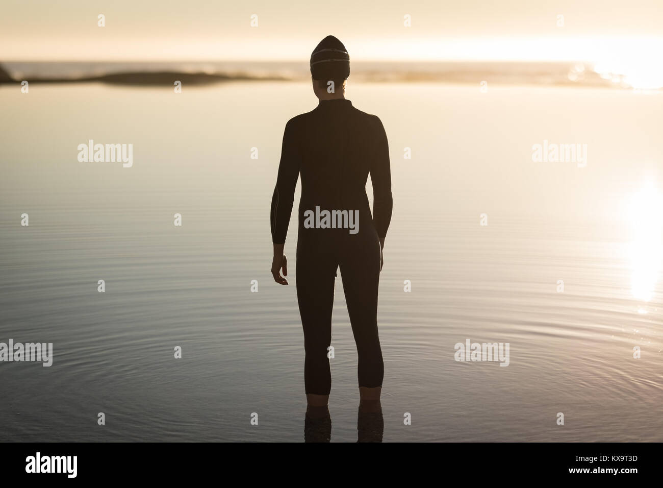 Woman standing watching sea hi-res stock photography and images - Alamy