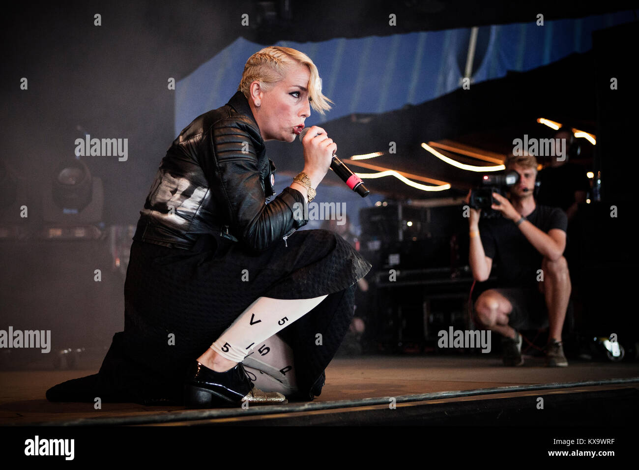 The Swedish singer-songwriter and musician Jenny Wilson performs a live  concert at the Arena Stage at Roskilde Festival 2014. Denmark 05.07.20104  Stock Photo - Alamy