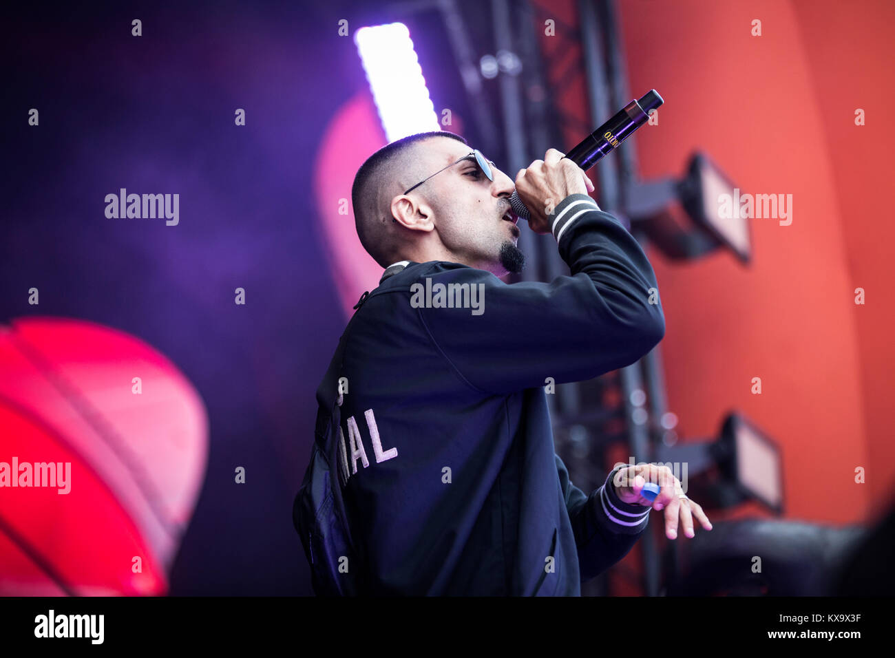 The Danish rapper Sivas (Stylized S!vas) performs a live concert at the Apollo Countdown stage at Roskilde Festival 2014. Sivas mess up the Danish dictionary combining Danish, English and Arabian in one big ghetto mixture. Denmark 02.07.2014. Stock Photo