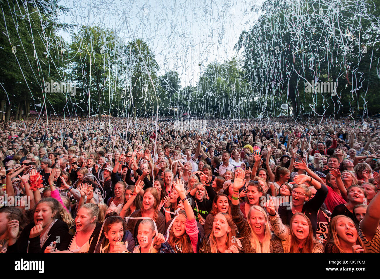 The festival crowds, and especially the teenage fans, go crazy when the  Danish pop star Rasmus