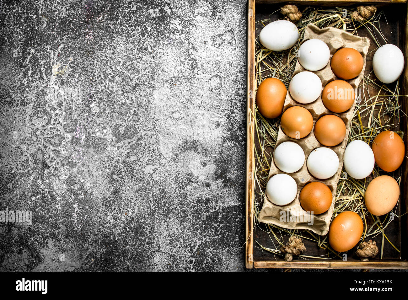 Fresh chicken eggs on an old tray. On a rustic background Stock Photo ...