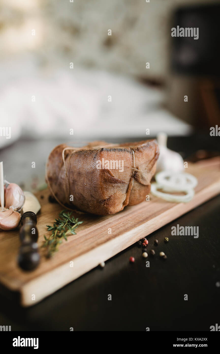 Chunk of salted smoked lard in gauze with a rope.Traditional Russian