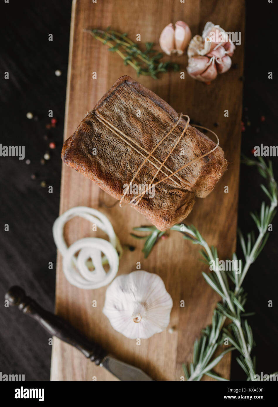 Chunk of salted smoked lard in gauze with a rope.Traditional Russian