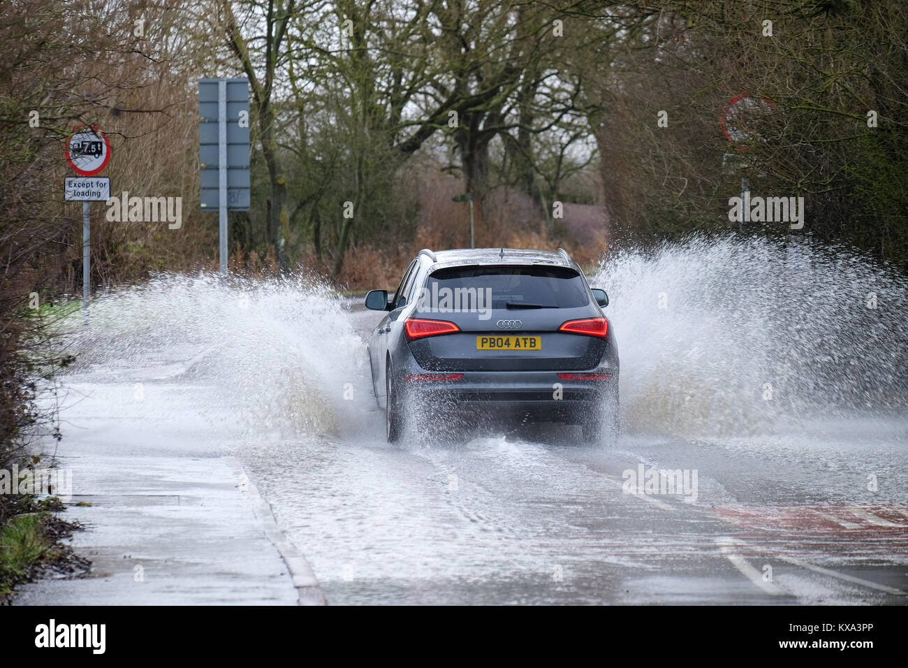cars drive through flood water on mountsorrel lane Stock Photo Alamy