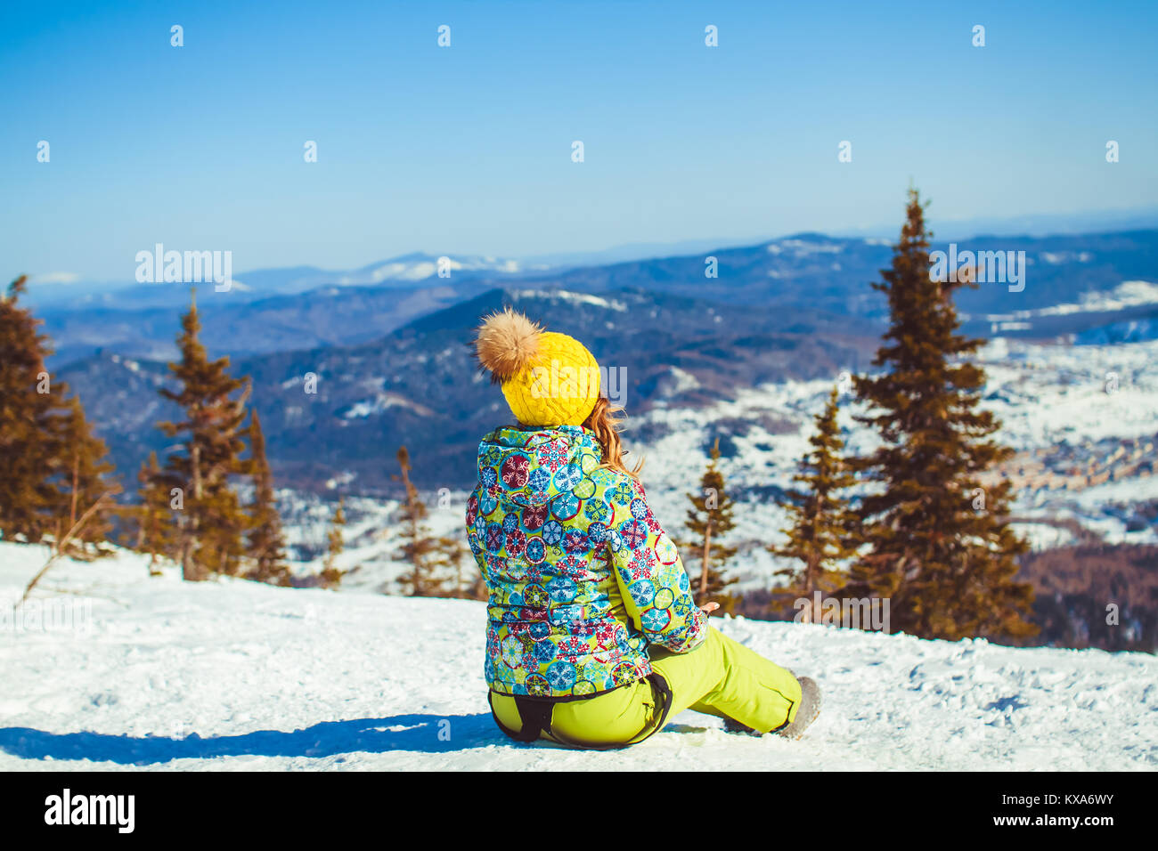 Girl sits on meadow hi-res stock photography and images - Alamy