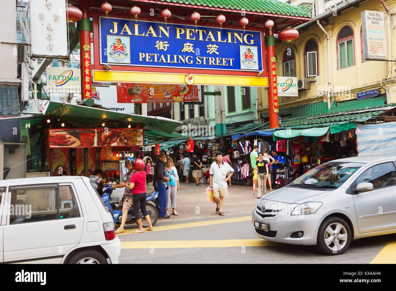 KUALA LUMPUR - DECEMBER 18: Petaling Street on December 18, 2012 in Kuala Lumpur, Malaysia. This street is a long market which specializes in counterf Stock Photo