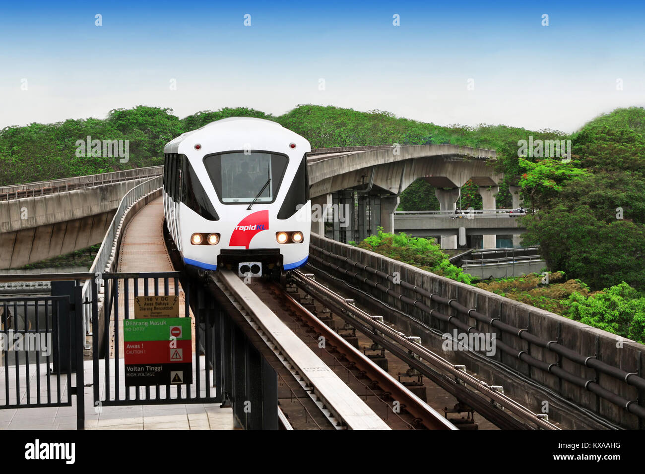 KUALA LUMPUR, MALAYSIA - DECEMBER 18: Monorail train on DECEMBER 18, 2012 in Kuala Lumpur, Malaysia. KL Monorail opened on 31 August 2003, and serves  Stock Photo