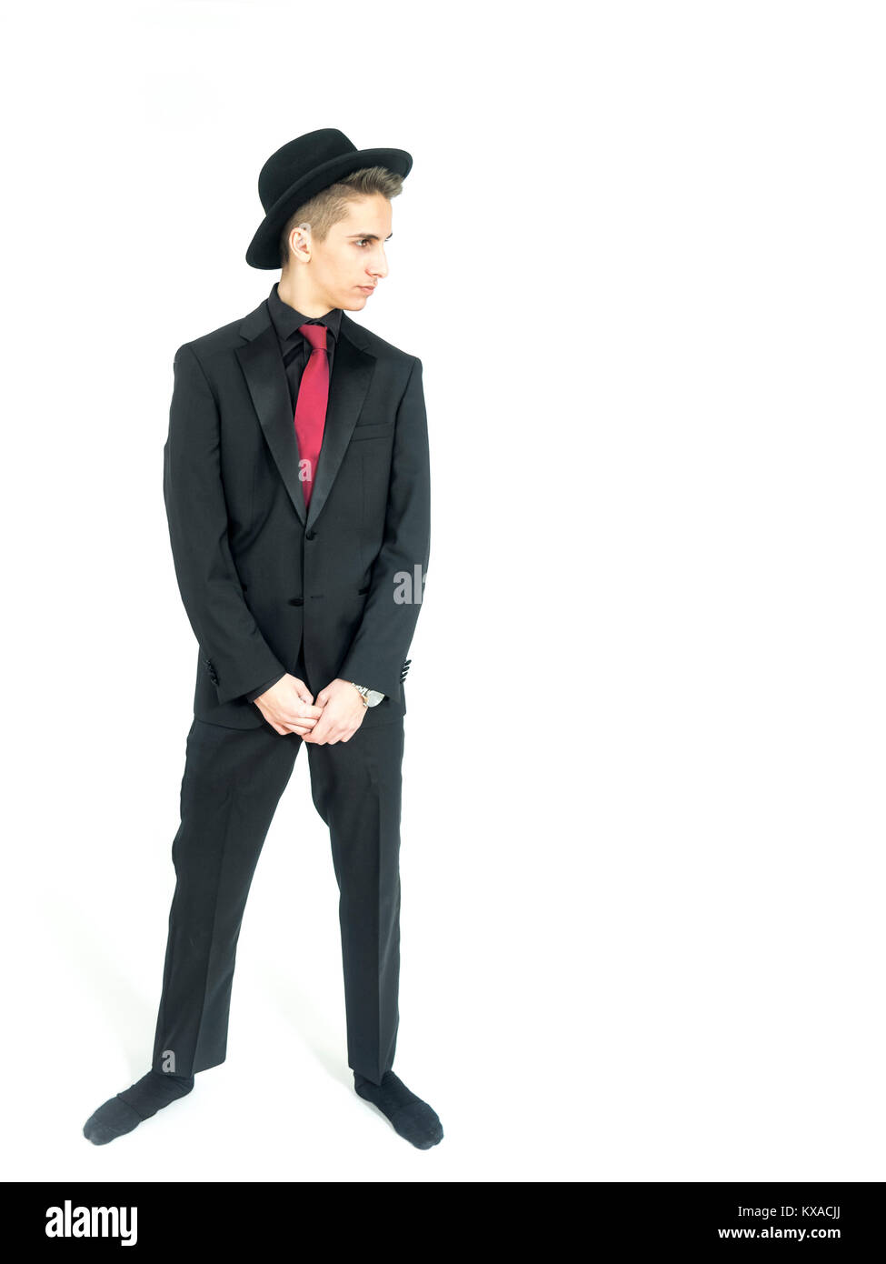 Man with black backdrop and suit Cut Out Stock Images & Pictures - Alamy