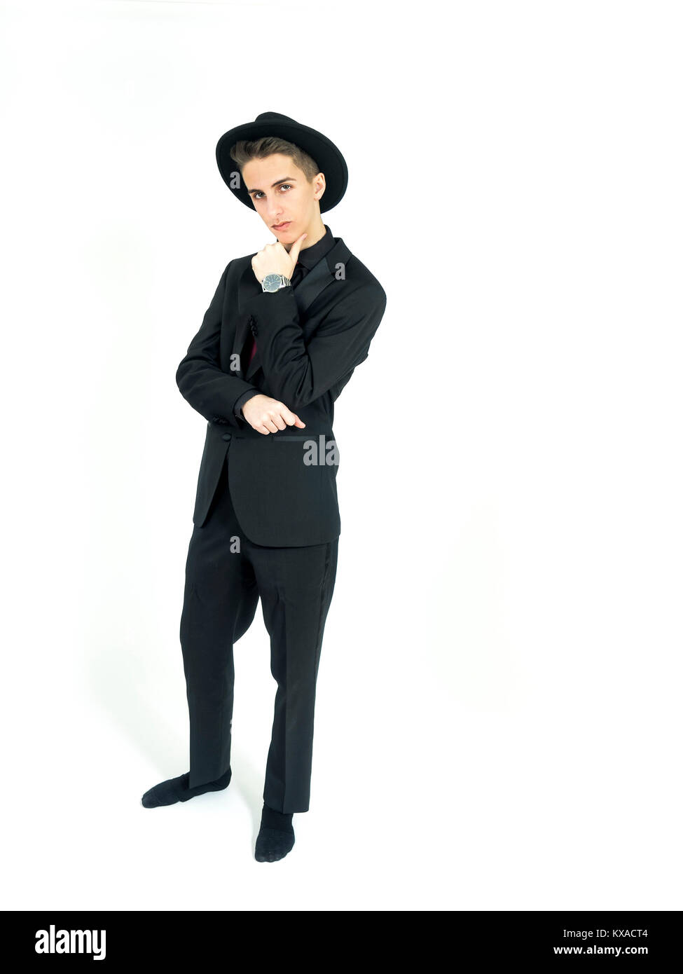 Man with black backdrop and suit Cut Out Stock Images & Pictures - Alamy