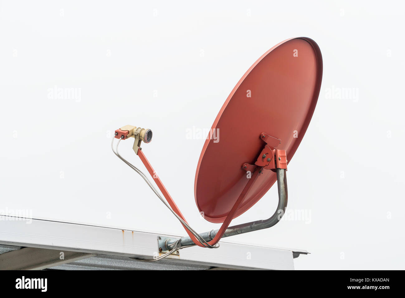red satellite dish on roof for tv channel of thailand Stock Photo 