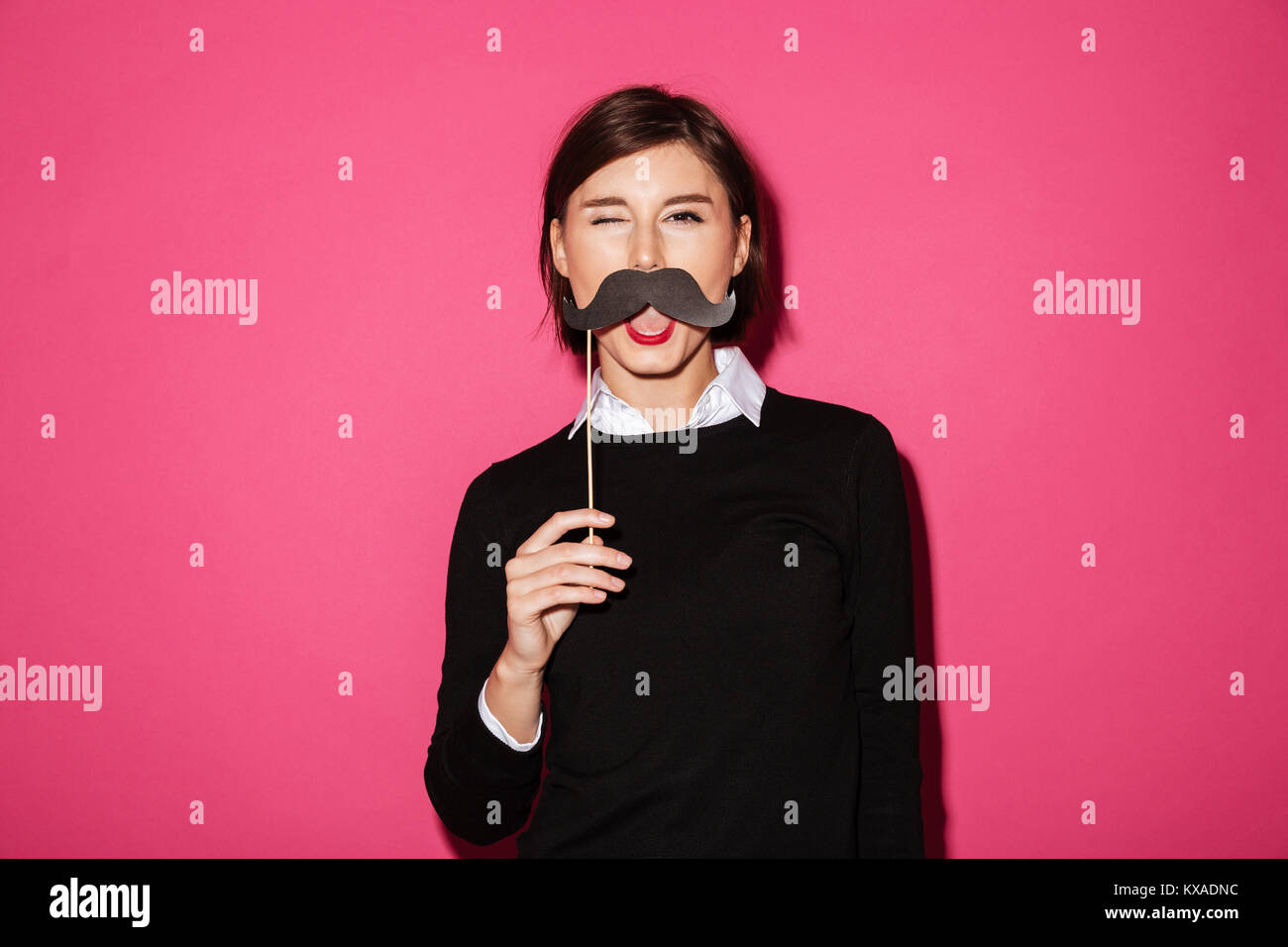 Woman wearing fake moustache hi-res stock photography and images - Alamy