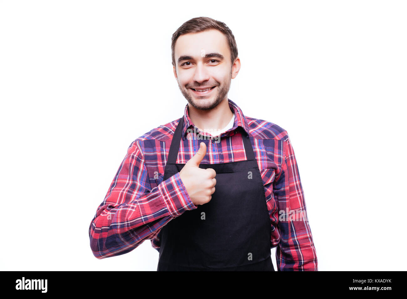 confident shopkeeper giving thumb up, concept of successful small business owner, shop manager, entrepreneur studio isolated Stock Photo