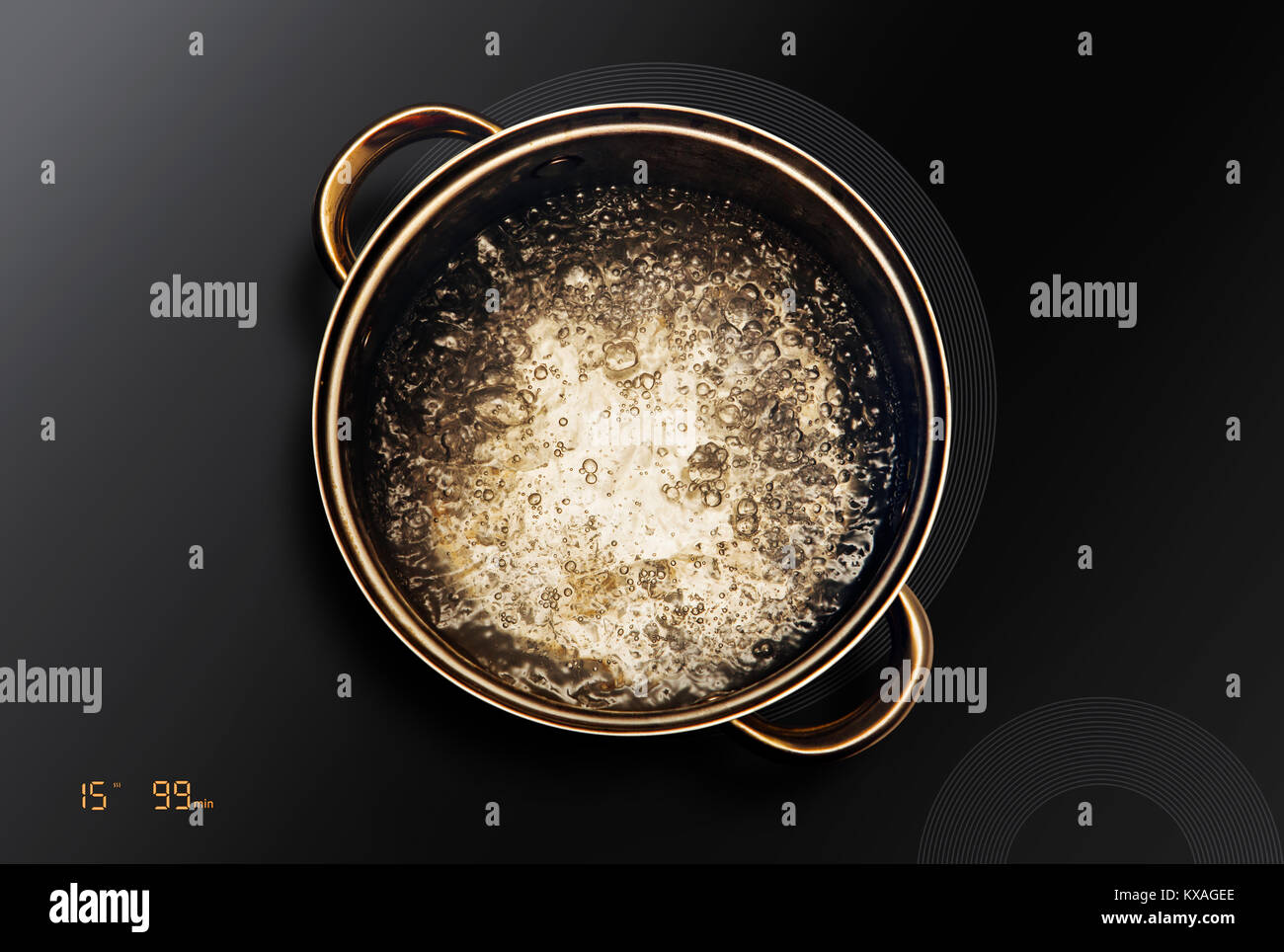 Boiling Water In Saucepan That On An Induction Cooktop Stock Photo