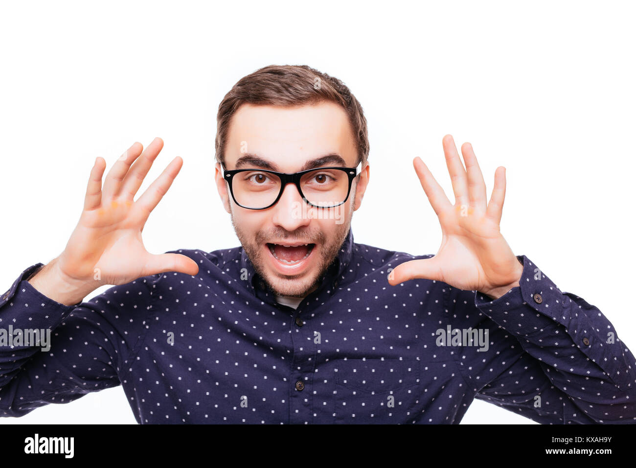 Retarded man making funny faces is silly Stock Photo