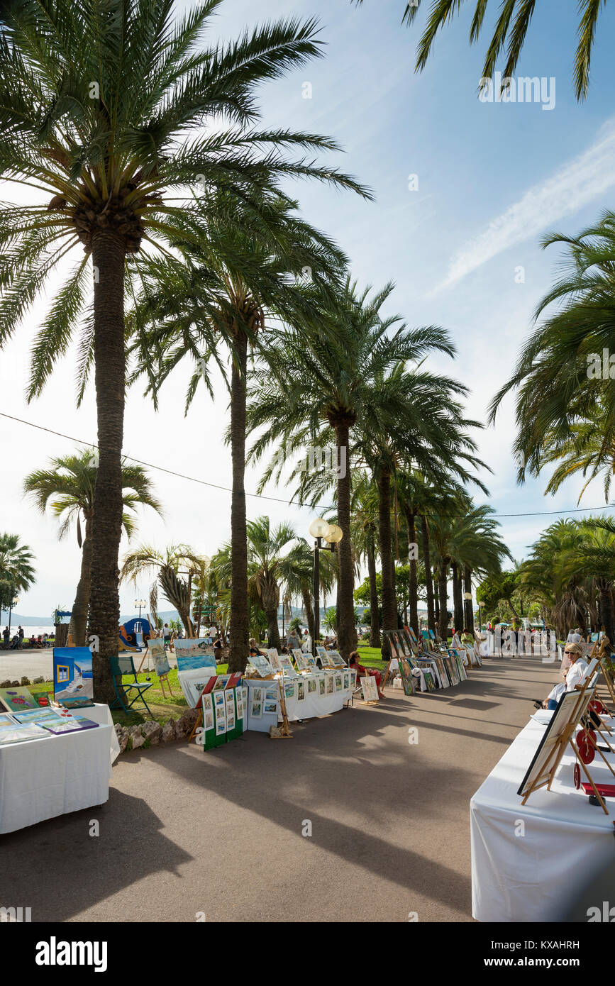 Palm trees on the beach promenade, Cannes, Côte d' Azur, Provence-Alpes-Côte d' Azur, South of France, France Stock Photo