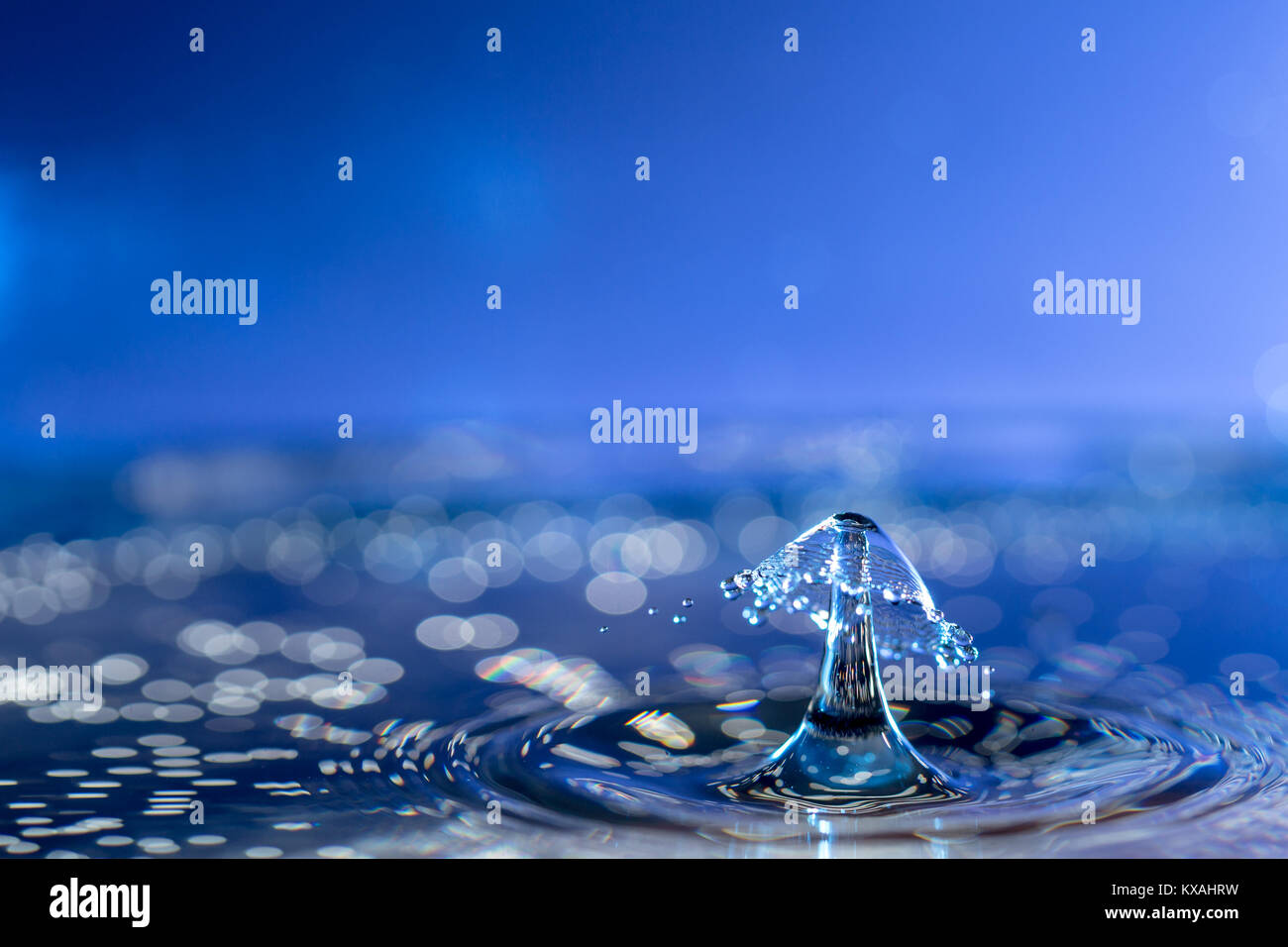 Photograph Of Water Droplets With A Coloured Background Also Known As Water Droplet Collision Stock Photo Alamy