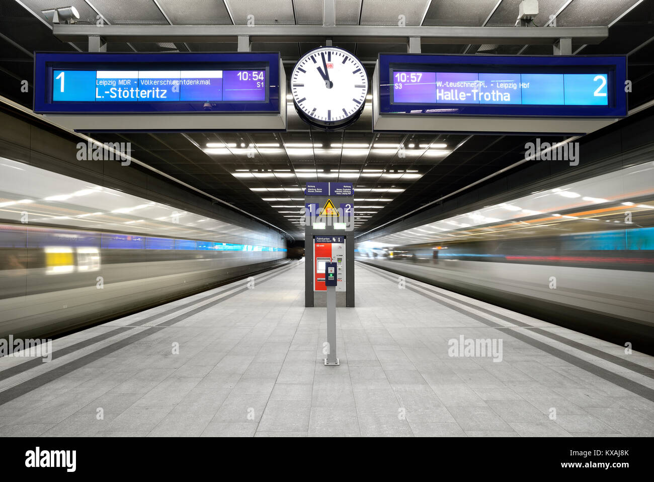 City-Tunnel Leipzig, stopping point Bayerischer Bahnhof, moving S-Bahn, suburban train, scoreboards, long-term exposure Stock Photo