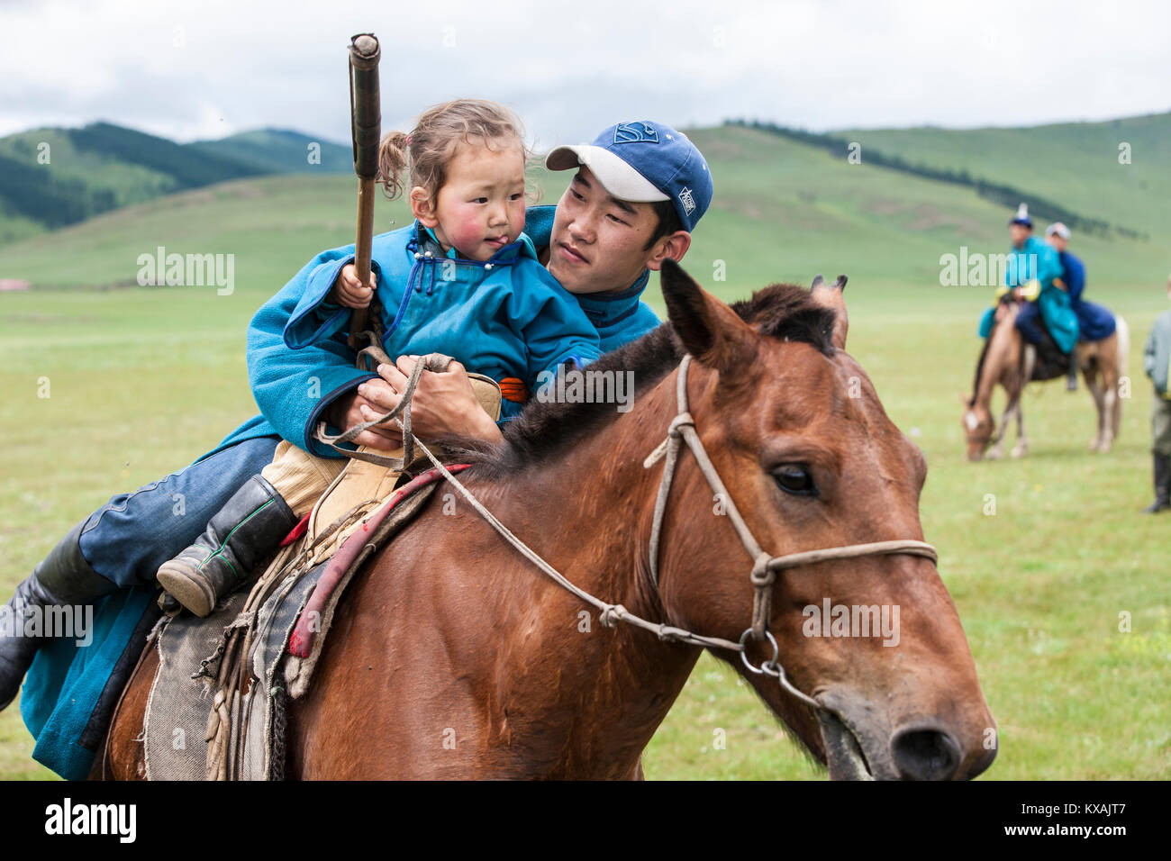 Young riders gather at Naadam Festival for horse race in Bunkhan Valley, Bulgan, Mongolia Stock Photo