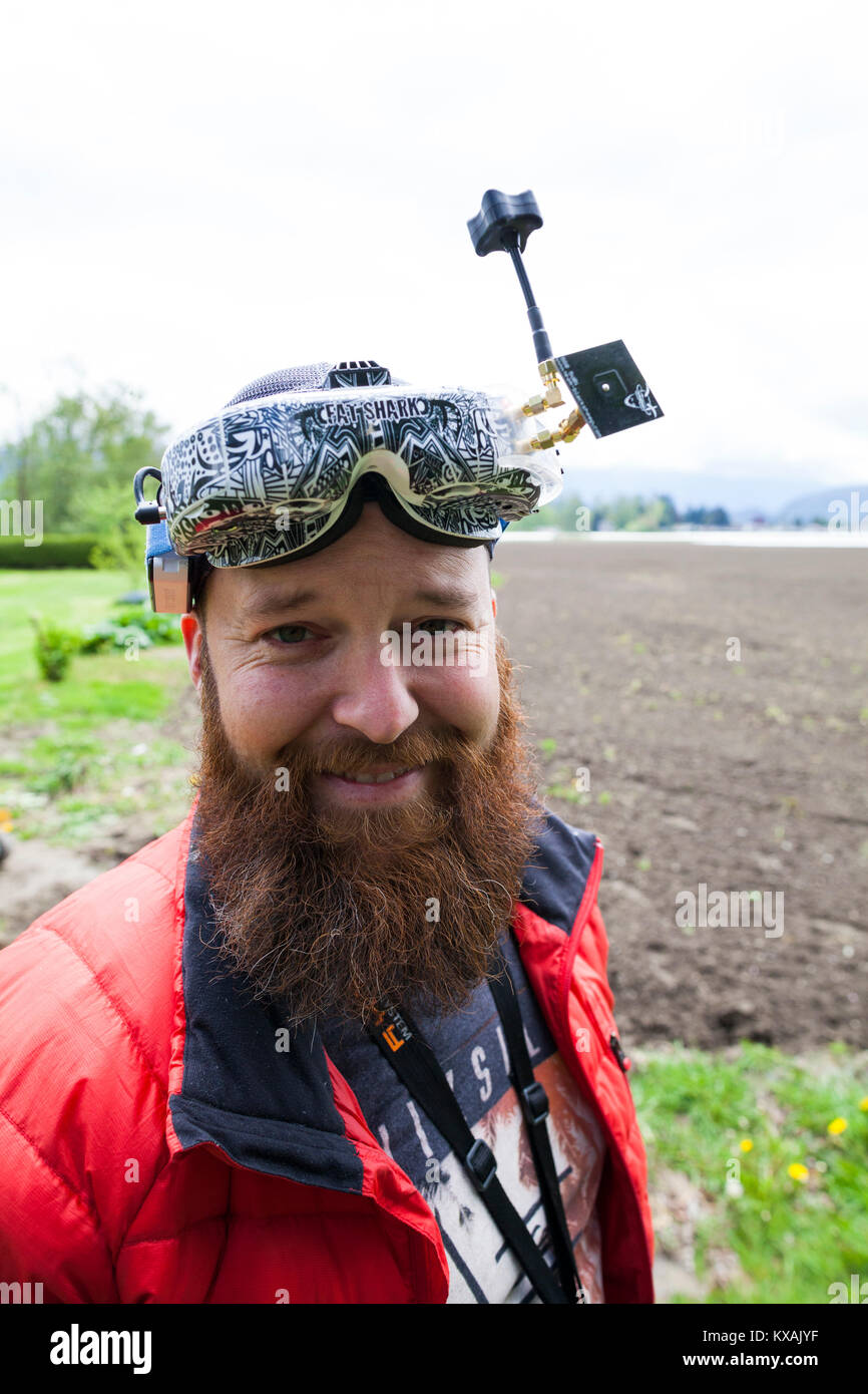 Portrait of drone pilot using virtual reality, Chilliwack, British Columbia, Canada Stock Photo