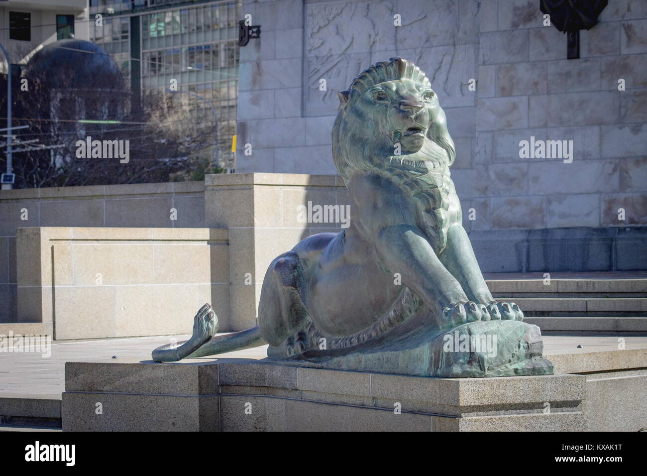 Wellington, New Zealand - 28 September, 2015: Bronze Lion at the base of the Wellington Cenotaph located  on the intersection of Lambton Quay and Bowe Stock Photo