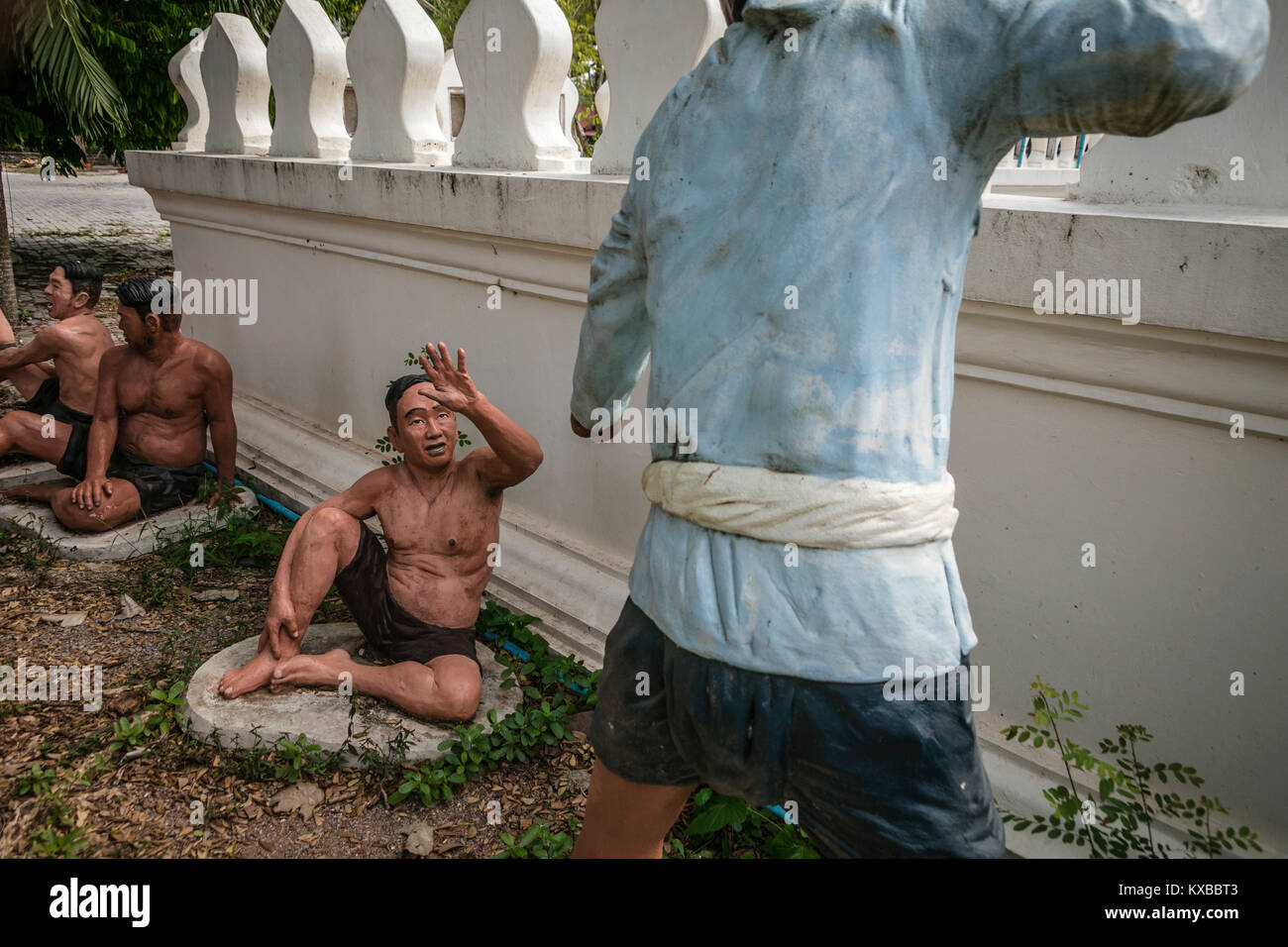 Life size statues of prisoners undergoing punishment, Bang Kung Camp, Samut Songkhram, Thailand. Stock Photo