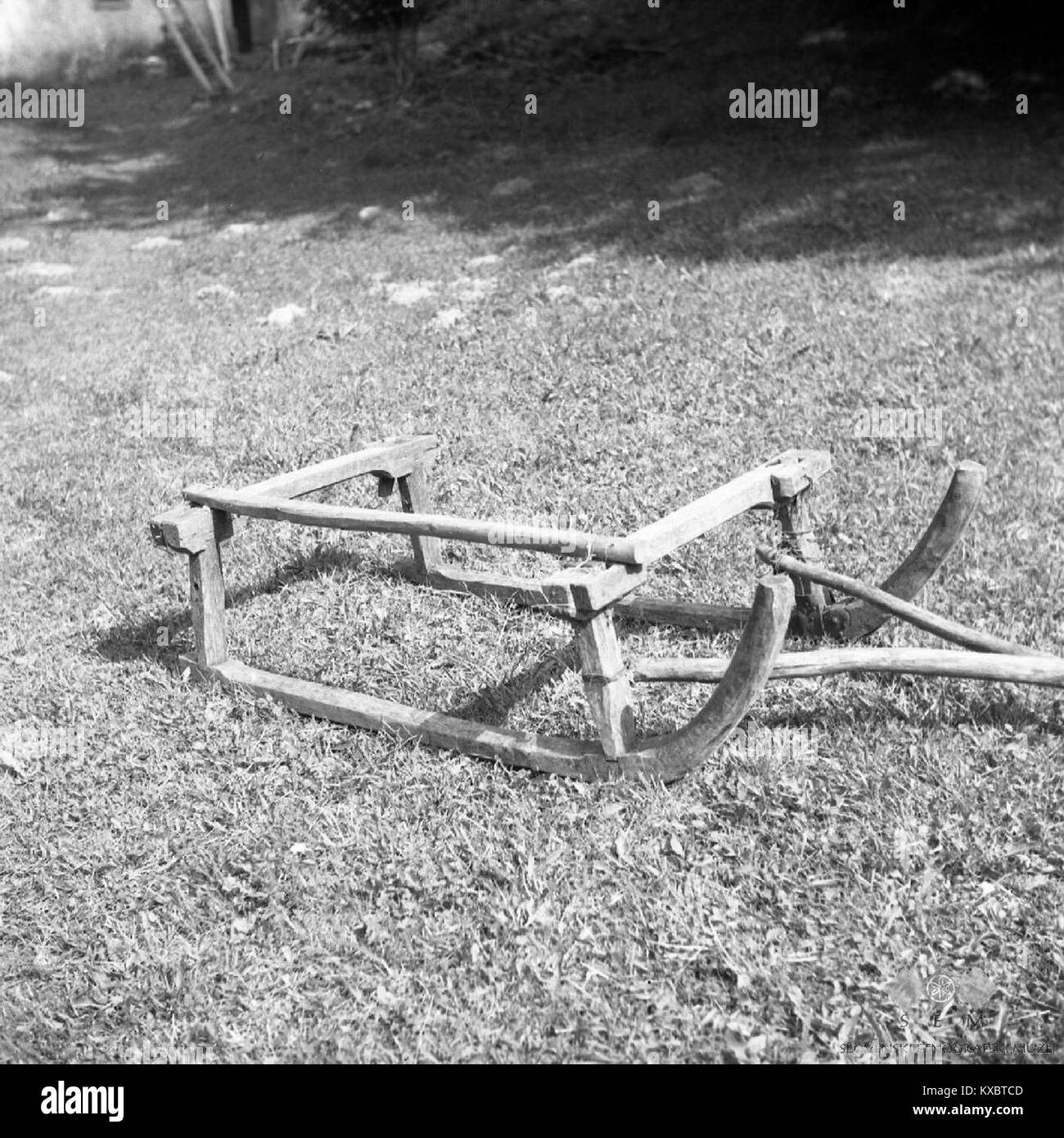 This is a description of a traditional wooden object, a Smuci, measured at 109 cm in length and 74 cm in width, dating from 1959. It is part of the Javornik collection. Stock Photo